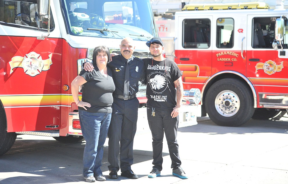 Prescott Fire Captain Alan Snyder with his wife Rhonda and son Michael before his Appointment and Promotion Recognition Ceremony at Station 71 in Prescott Friday, October 6. (Les Stukenberg/Courier)