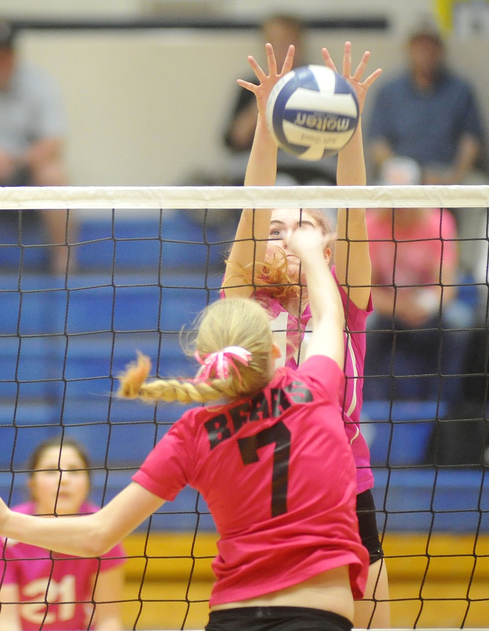 Prescott's Daphne Skinner (14) gets the block on Rylee Bundrick (7) as the Badgers hosted crosstown rival Bradshaw Mountain in volleyball Monday night. (Les Stukenberg/Courier)