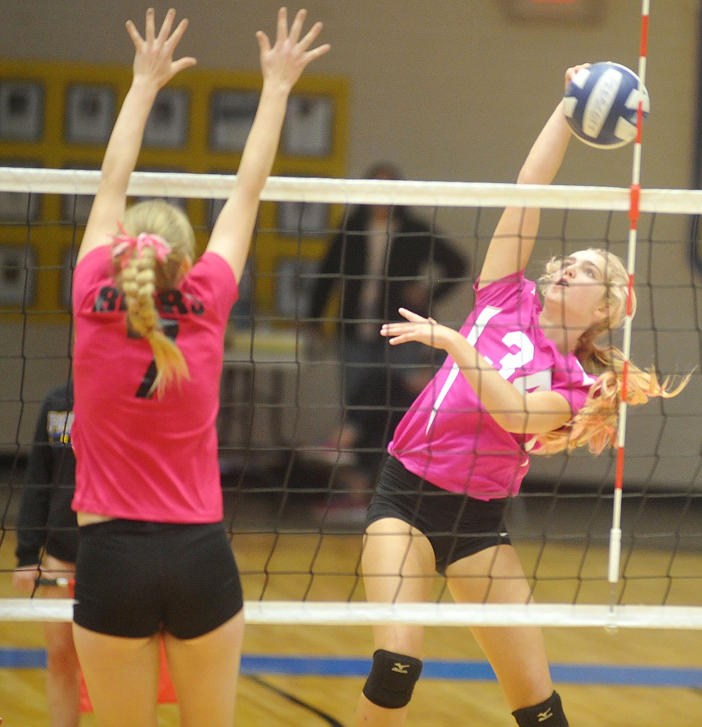 Prescott's Katherine Radavich goes for the kill down the line as the Badgers hosted crosstown rival Bradshaw Mountain in volleyball Monday night. (Les Stukenberg/Courier)