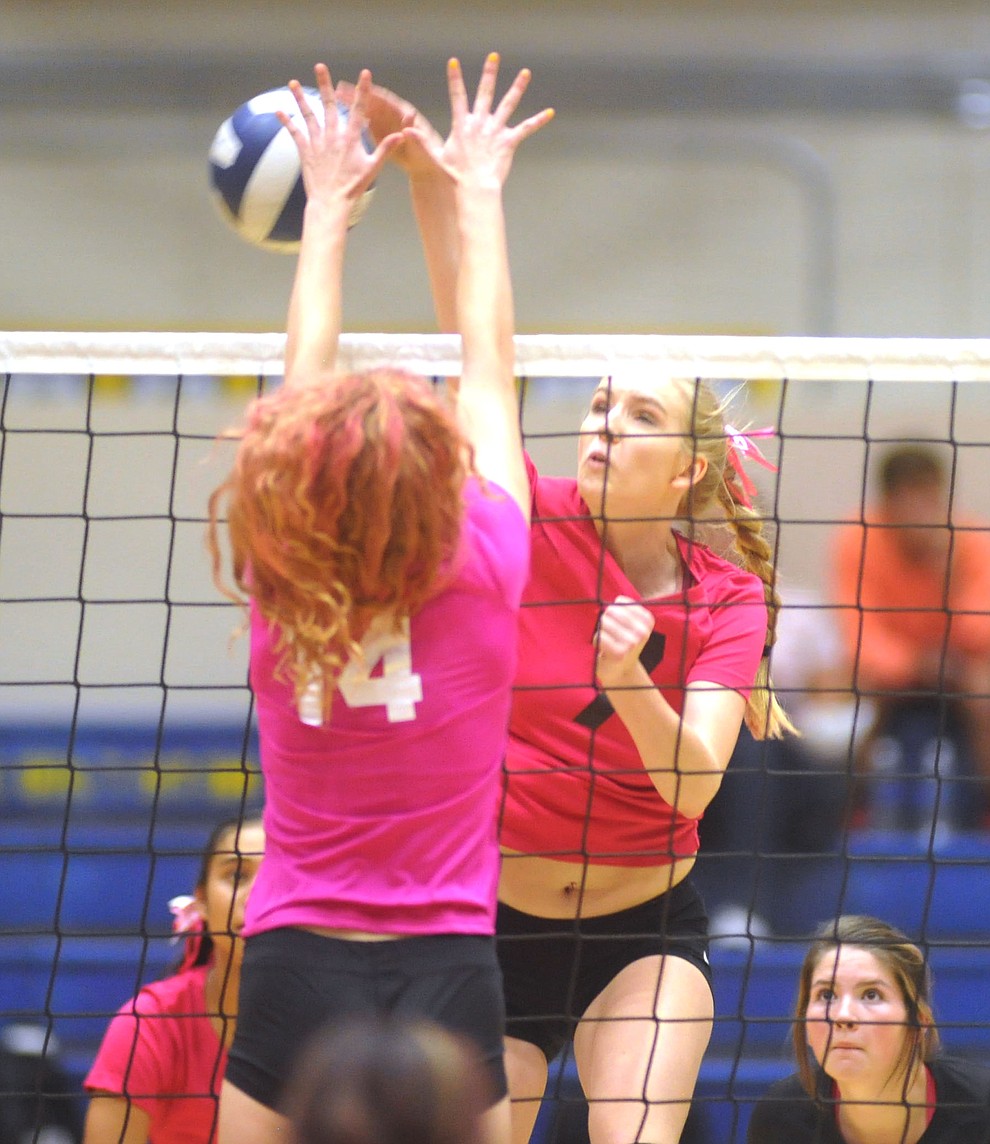Bradshaw Mountain's Rylee Bundrick (7) goes for a kill on Daphne Skinner (14) as the Bears traveled to crosstown rival Prescott for a volleyball matchup Monday night. (Les Stukenberg/Courier)