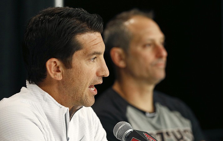 Arizona Diamondbacks general manager Mike Hazen, left, speaks during a news conference as manager Torey Lovullo, right, listens Tuesday, Oct. 10, 2017, at Chase Field in Phoenix. (Ross D. Franklin/AP)