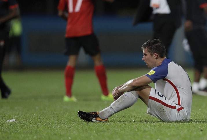United States’ Matt Besler squats on the pitch after losing 2-1 against Trinidad and Tobago during a 2018 World Cup qualifying soccer match Tuesday, Oct. 10, 2017, in Couva, Trinidad. (Rebecca Blackwell/AP)