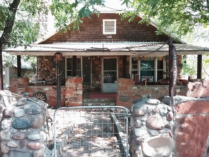 The one-of-a-kind stone house of Luther White, still largely in its original condition, features the work of local builders and craftsmen who installed built-ins and a unique fireplace.  (Courtesy Photo)

