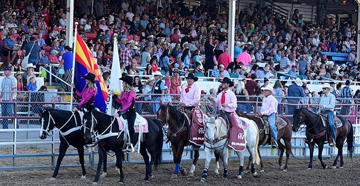 The grand entry of the 2nd performance of the 2017 Prescott Frontier Days Rodeo at the Prescott Rodeo Grounds Thursday, June 29.  (Les Stukenberg/Courier)