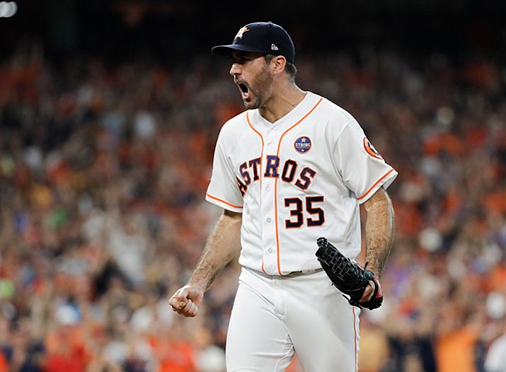 Houston Astros starting pitcher Justin Verlander reacts after getting New York Yankees' Greg Bird to ground out during the ninth inning of Game 2 of baseball's American League Championship Series Saturday, Oct. 14, in Houston. (David J. Phillip/AP)