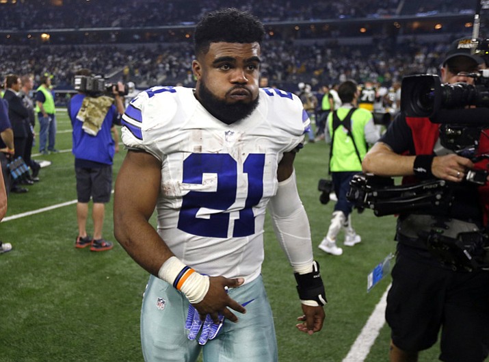 In this Jan. 15, 2017, file photo, Dallas Cowboys’ Ezekiel Elliott walks off the field after losing to the Green Bay Packers in an NFL divisional playoff football game in Arlington, Texas. (Michael Ainsworth/AP, File)