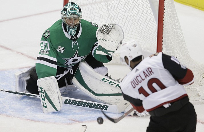 Dallas Stars goalie Ben Bishop (30) defends the goal against Arizona Coyotes left wing Anthony Duclair (10) during the third period in Dallas, Tuesday, Oct. 17, 2017. The Stars won 3-1. (LM Otero/AP)