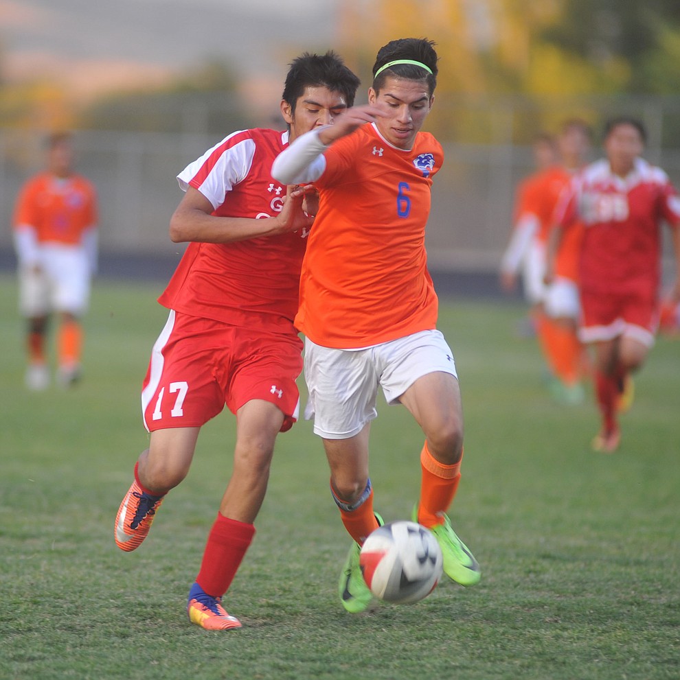 Chino Valley's Johnny Gomez-Beltran (6) moves the ball upfield as the Cougars take on the Grand Canyon Phantoms Wednesday night in Chino Valley. (Les Stukenberg/Courier)