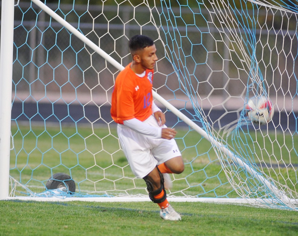 Chino Valley's Michael Pina scores a goal as the Cougars take on the Grand Canyon Phantoms Wednesday night in Chino Valley. (Les Stukenberg/Courier)