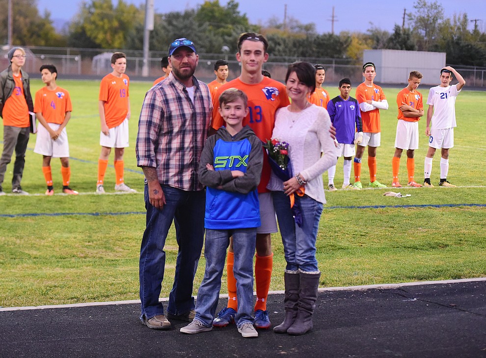 Ty Richmond and his family during senior night for the Chino Valley High School Soccer Team Wednesday night. (Les Stukenberg/Courier)