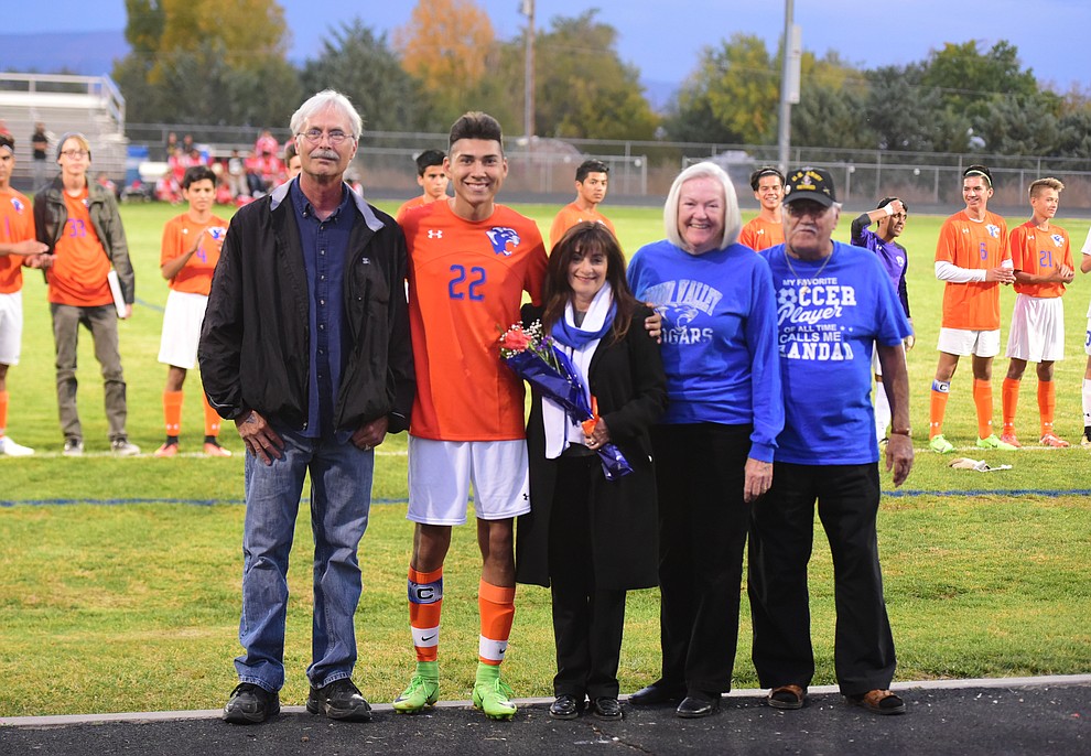 Mathew Rios-Jakeway and his family during senior night for the Chino Valley High School Soccer Team Wednesday night. (Les Stukenberg/Courier)