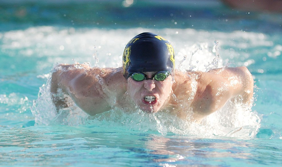 Prescott's Paul Kinach swims the butterfly as the Badgers traveled to Bradshaw Mountain for a swim meet at Mountain Valley Splash Thursday afternoon in Prescott Valley. (Les Stukenberg/Courier)