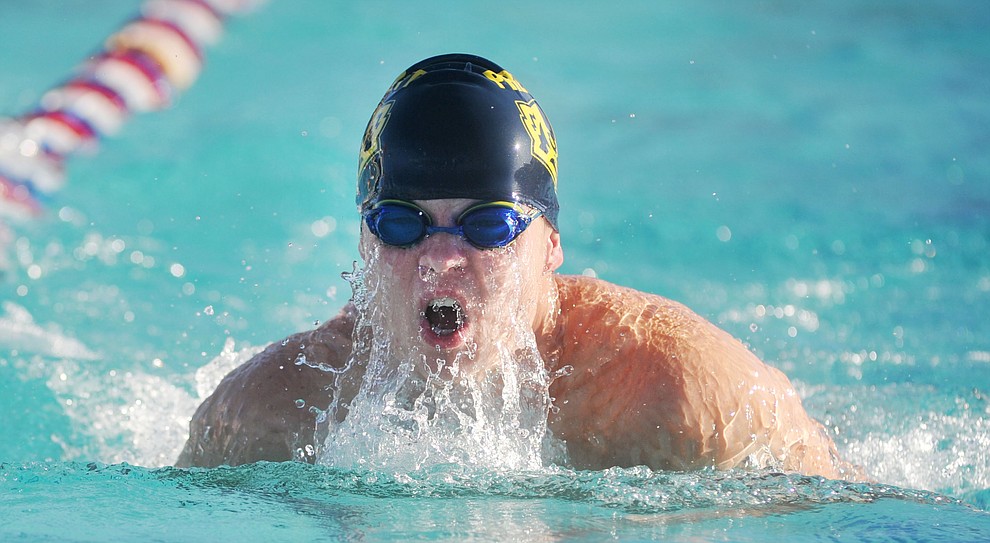 Prescott's Tate Bassett swims the breast stroke as the Badgers traveled to Bradshaw Mountain for a swim meet at Mountain Valley Splash Thursday afternoon in Prescott Valley. (Les Stukenberg/Courier)