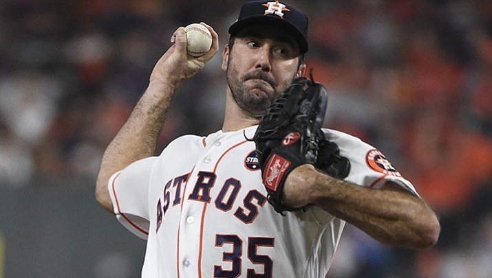Houston Astros starting pitcher Justin Verlander throws during the second inning of Game 6 of baseball's American League Championship Series against the New York Yankees Friday, Oct. 20, in Houston.