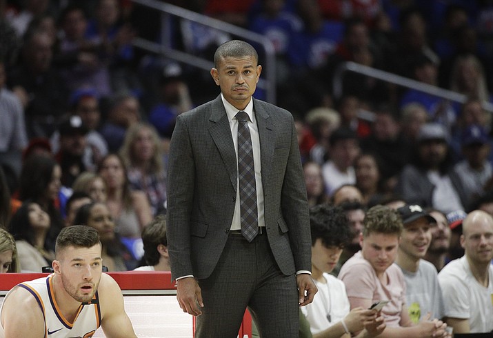 In this Oct. 21, photo, Phoenix Suns head coach Earl Watson watches action during the second half of an NBA basketball game against the Los Angeles Clippers in Los Angeles. He was fired Sunday after an 0-3 start, including two losses of more than 40 points. (Jae C. Hong/AP)