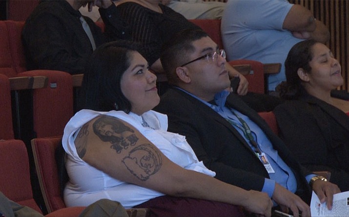 Tribal Judge Claudette White watches the “Tribal Justice” screening in Phoenix. Photo/Courtney Mally, Cronkite News