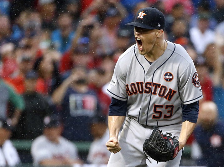 Houston Astros closing pitcher Ken Giles celebrates the Astros 5-4 victory over the Boston Red Sox in Game 4 of baseball's American League Division Series, Monday, Oct. 9, 2017, in Boston. (Michael Dwyer/AP)