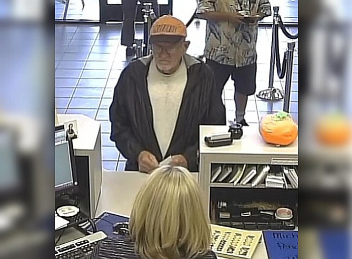 Police say this is John Wayne McGuire, 76, of Arbor Vitae, Wisconsin during the Oct. 17 bank robbery in Bullhead City. (Bullhead City Police Department)