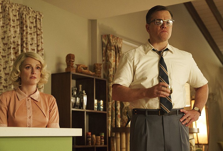 This file image released by Paramount Pictures shows Julianne Moore, left, and Matt Damon in a scene from "Suburbicon." (Hilary Bronwyn Gayle/Paramount Pictures via AP)