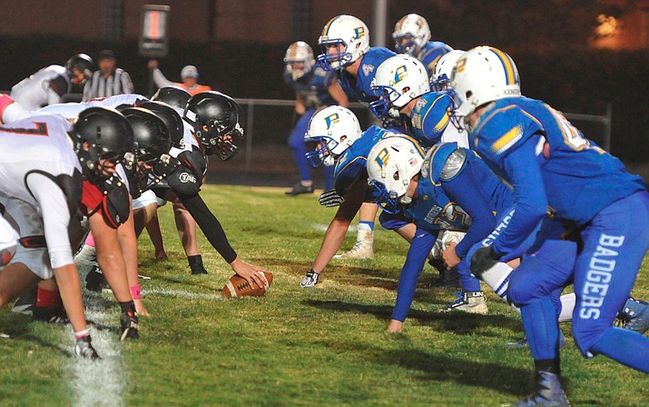 The Prescott Badgers' defense lines up against rival Bradshaw Mountain on Friday, Oct. 27, 2017, in Prescott. Prescott was on the outside looking in after the AIA released the 4A state playoff bracket Saturday morning, making it the fifth straight season the Badgers have not made the playoffs. (Les Stukenberg/Courier, File)