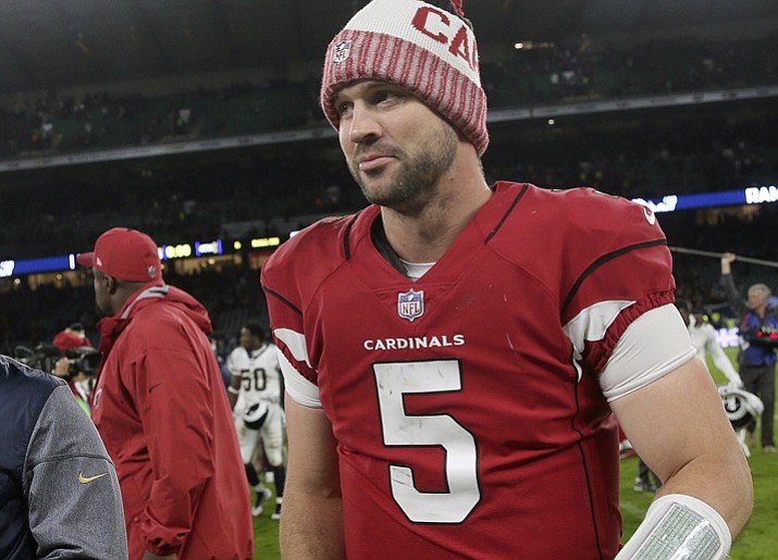 In this Oct. 22, 2017, file photo, Arizona Cardinals quarterback Drew Stanton (5) leaves the field after an NFL game against the Los Angeles Rams, in London, England. These are Drew Stanton’s Cardinals now. The career backup who’s spent the last six years with coach Bruce Arians is the man at the controls of the Arizona Cardinals, with Blaine Gabbert his backup and Carson Palmer probably out for the rest of the season. (Tim Ireland/AP)