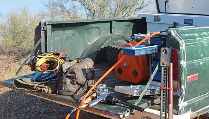 Have you ever seen a work truck like this? How about in a parking lot? It is illegal to take anything from an obviously “unlocked” vehicle. (Courier file)