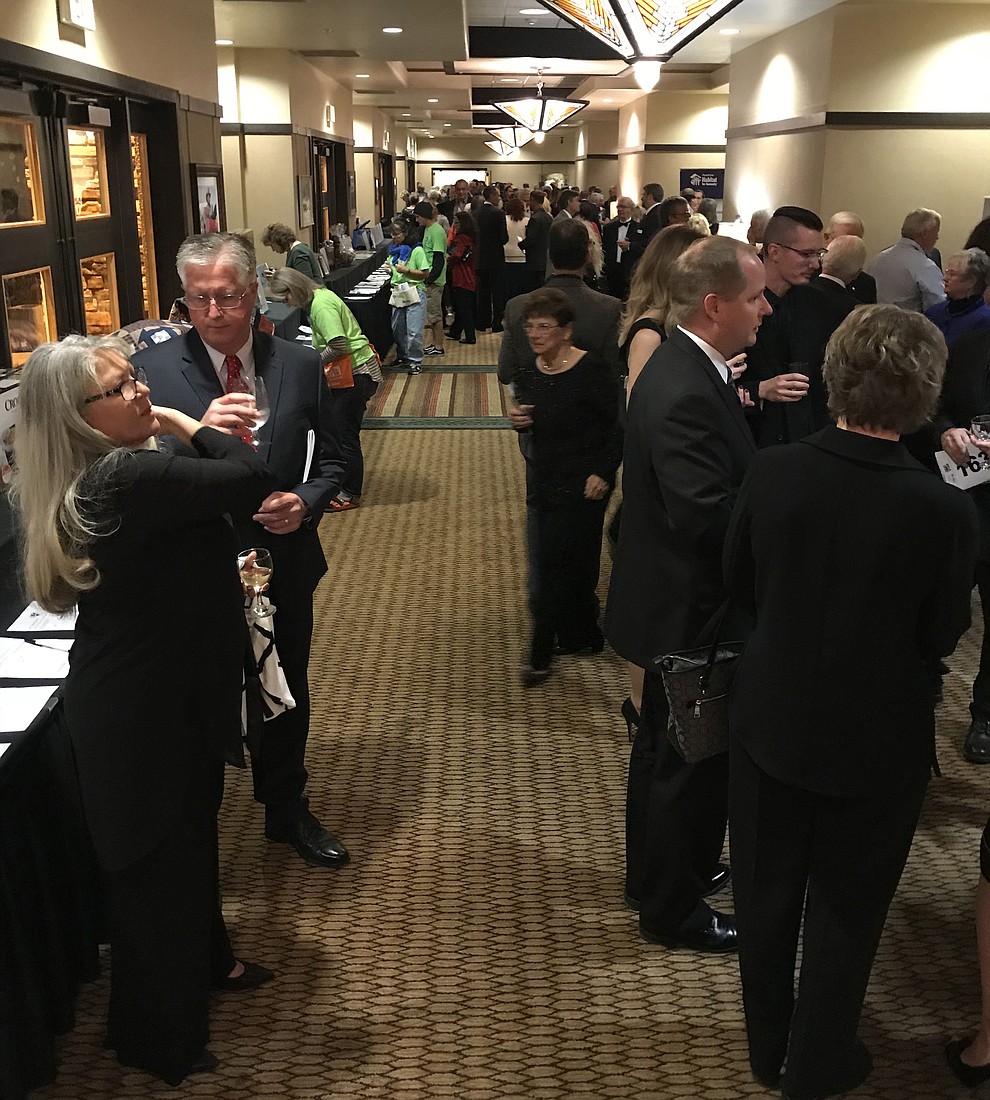 A silent auction and reception preceeded the Prescott Area Habitat for Humanity's 2017 Toolbelts & Tuxedos Gala on Saturday, Nov. 11, at the Prescott Resort. (Kelly Soldwedel/PNI)