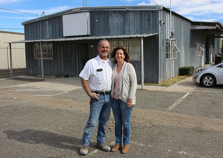 Bill and Kim Gagnon, owners of The Plumbing Store, stand in front of their new property, the former home of the Granite Mountain Hotshots. The Gagnons hope to move in and begin operating their business there by the end of this year. 