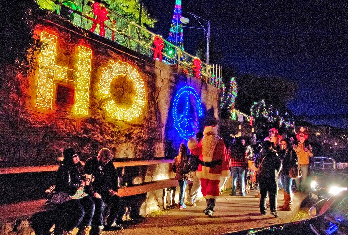 Christmas begins at the top of the mountain on November 25th in historic Jerome. Luminaries will light the streets at 5pm, Mingus Union High School Choir and Jazz Band will perform and  Santa stops by for photos and to flip the switch at 6pm, lighting the park with a fabulous display of holiday cheer. Photo by Ron Chilston.