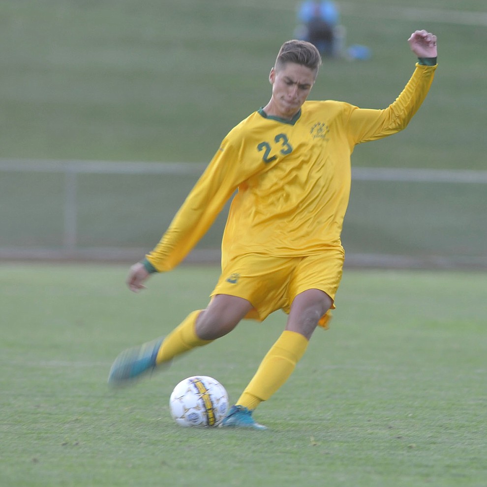 Yavapai's John Scearce send the ball upfield as the Roughriders take on Waubonsee Community College in the opening round of the NJCAA Division 1 National Championship Tuesday night in Prescott Valley. (Les Stukenberg/Courier)