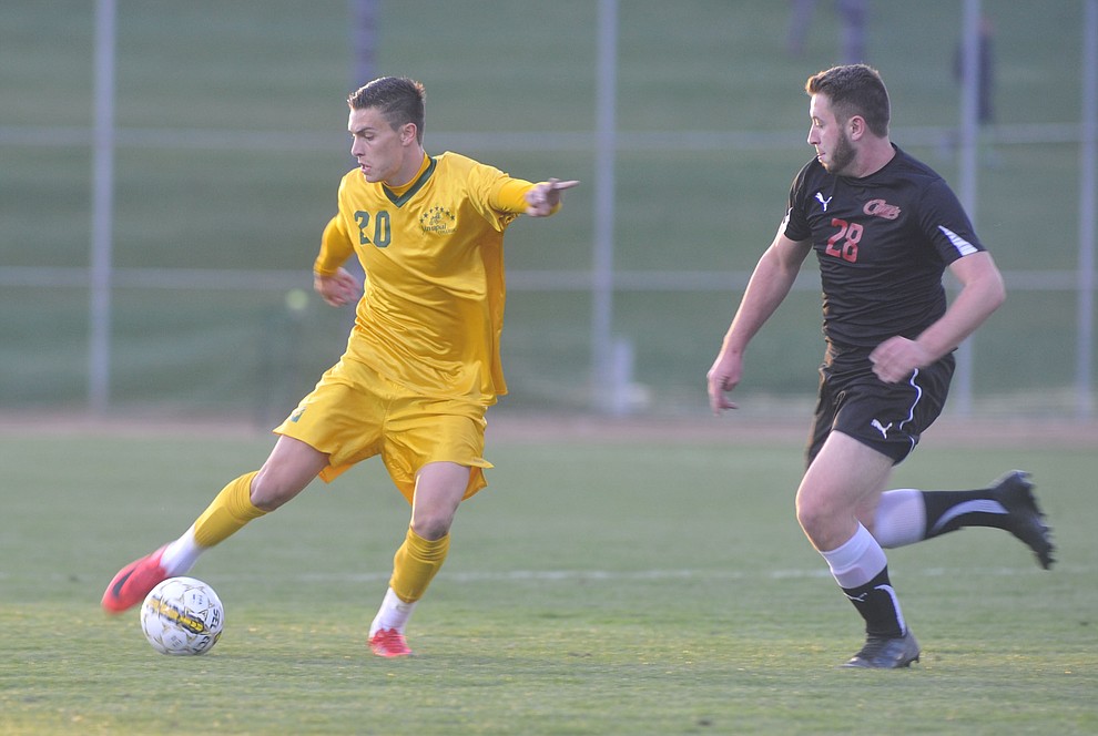 Yavapai's William Baynham maneuvers the ball as the Roughriders take on Waubonsee Community College in the opening round of the NJCAA Division 1 National Championship Tuesday night in Prescott Valley. (Les Stukenberg/Courier)
