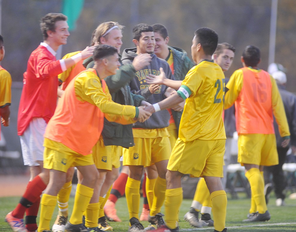 Yavapai's Jose Perez Flores celebrates his first half goal as the Roughriders take on Waubonsee Community College in the opening round of the NJCAA Division 1 National Championship Tuesday night in Prescott Valley. (Les Stukenberg/Courier)