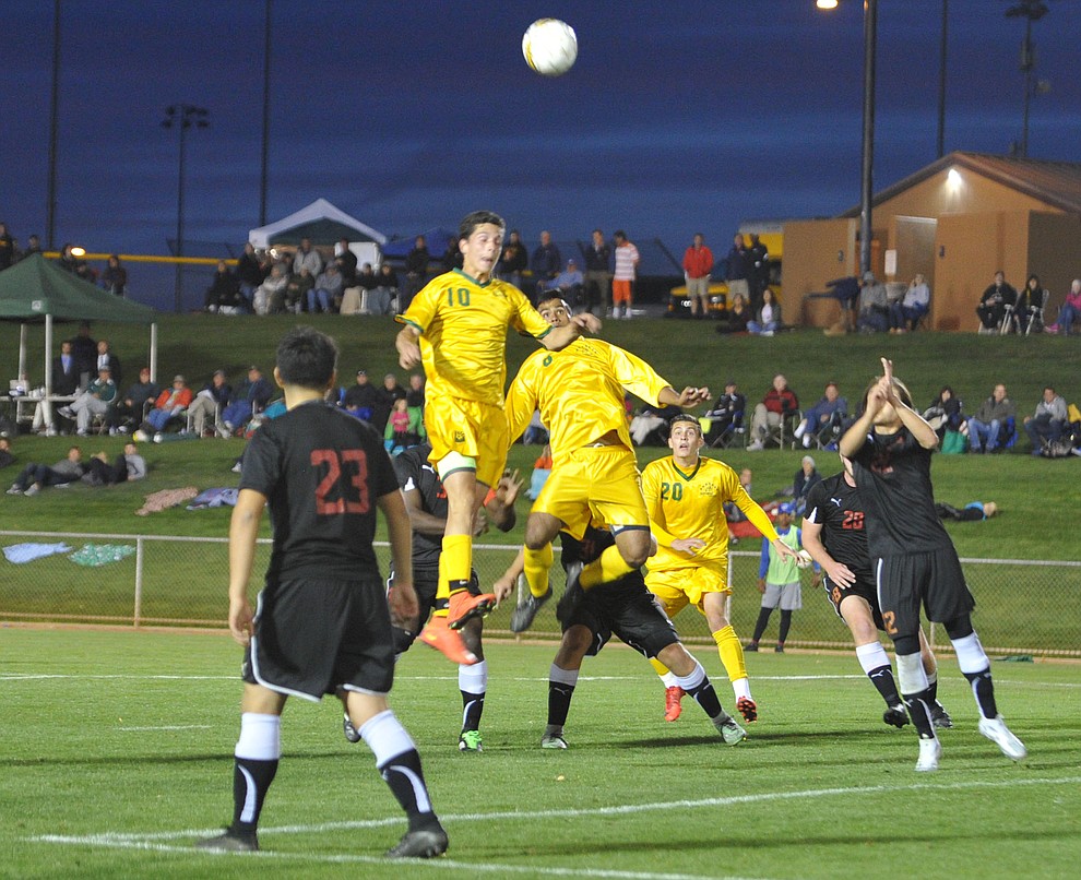 Yavapai players go up on a set corner kick play as the Roughriders take on Waubonsee Community College in the opening round of the NJCAA Division 1 National Championship Tuesday night in Prescott Valley. (Les Stukenberg/Courier)