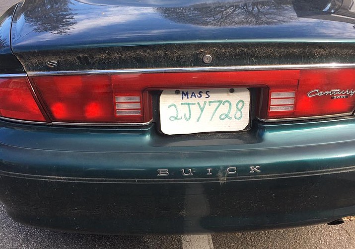 The Hopkinton, Massachusetts Police Department says in a Facebook post Sunday a driver was stopped with a license plate made from a pizza box. (Hopkinton, Massachusetts Police Department)
