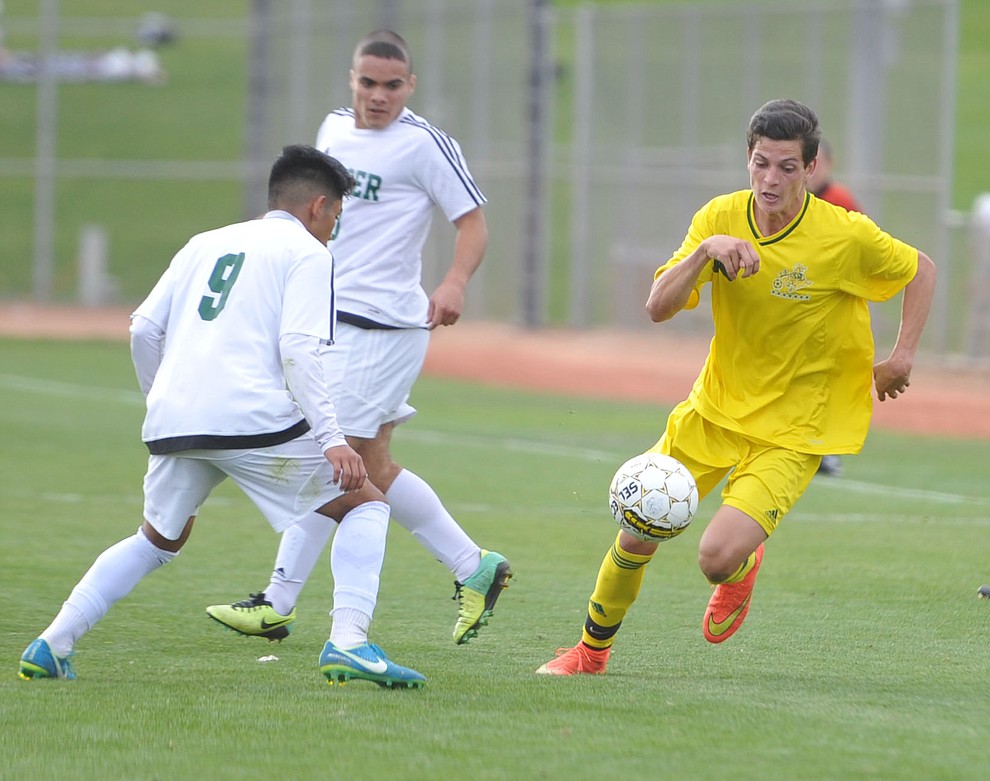 Yavapai's Carlo Quesdada (10) chases down the ball as the Roughriders take on Mercer County Community College in the second round of the NJCAA Division 1 National Championship Wednesday afternoon in Prescott Valley. (Les Stukenberg/Courier)