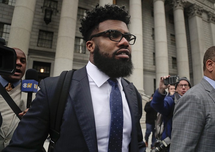 In this Thursday, Nov. 9, 2017, file photo, Dallas Cowboys NFL football star Ezekiel Elliott walks out of federal court in New York. (Julie Jacobson/AP, File)