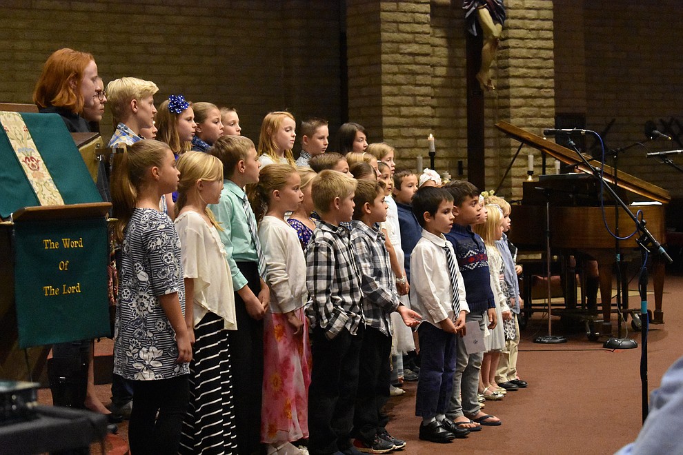 A children's choir from The Church of Jesus Christ of Latter-day Saints performs during the 2017 Celebration of Thanks concert sponsored by the Quad City Interfaith Council. (Richard Haddad/WNI)