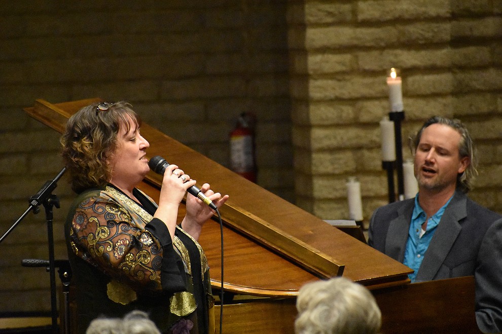 Rev. Kathleen Sibley sang a solo of "This is What I Know" accompanied on piano by Jackson Raunch  during the 2017 Celebration of Thanks concert at Sacred Heart Church in Prescott. The annual event is sponsored by the Quad City Interfaith Council. (Richard Haddad/WNI)