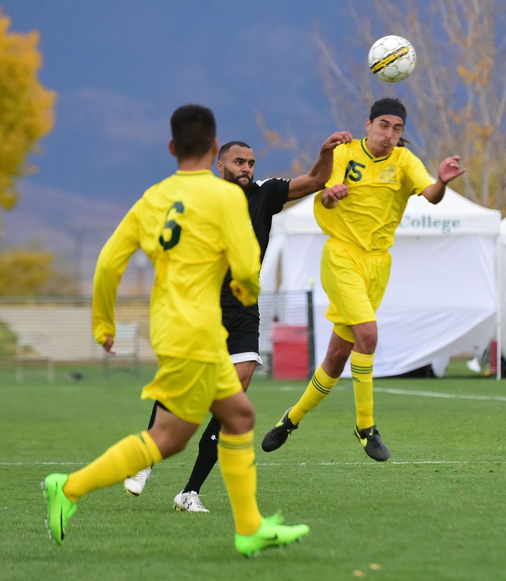 Yavapai's John Kanner heads the ball forward as the Roughriders take on Tyler Community College in the semifinals of the NJCAA Division 1 Men's National Championship in Prescott Valley Friday afternoon. (Les Stukenberg/Courier)