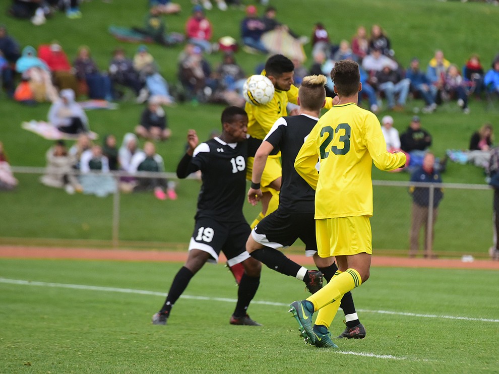 Yavapai's Ziyad Fares heads the ball as the Roughriders take on Tyler Community College in the semifinals of the NJCAA Division 1 Men's National Championship in Prescott Valley Friday afternoon. (Les Stukenberg/Courier)