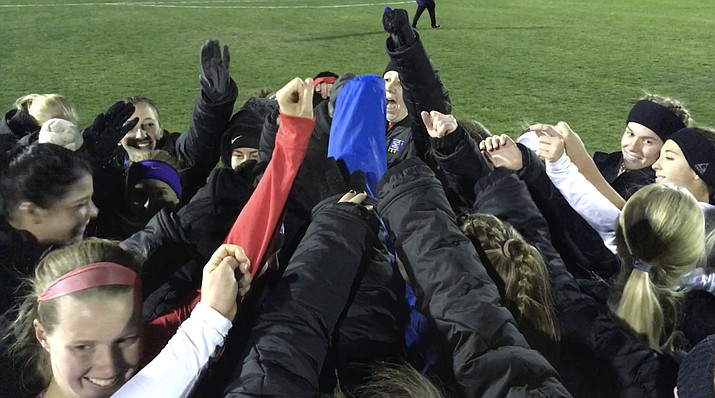 The Embry-Riddle women's soccer team gets together for a team cheer after defeating the University of Science & Arts 3-1 in the first round of the NAIA Women's Soccer National Championship Tournament on Saturday, Nov. 18, 2017, In Prescott. (Brian M. Bergner Jr./Courier)