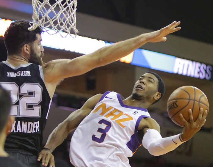 Northern Arizona guard Shaq Harrison tries to avoid a block attempt against the Austin Stars on Tuesday, Nov. 21, 2017, in Prescott Valley. (Matt Hinshaw/NAZ Suns)