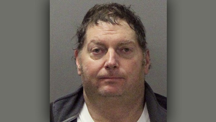 Authorities say Tracy Michael Mapes, 55, of Sacramento, Calif. was arrested after using a drone to drop anti-media leaflets over crowds at NFL games in Santa Clara and Oakland and that federal, state and local officials are investigating. (Santa Clara Police Department via AP)

