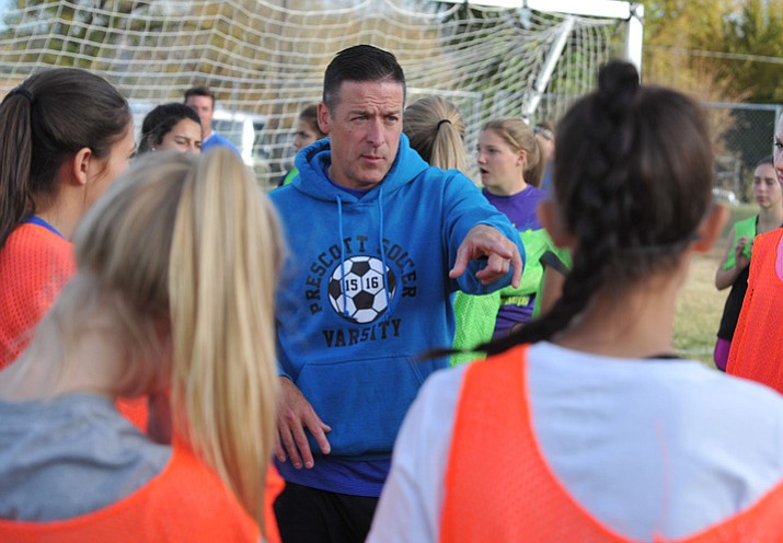 Prescott girls’ soccer head coach Paul Campuzano talks to players during practice after school Tuesday, Nov. 21, 2017, in Prescott. (Les Stukenberg/Courier)