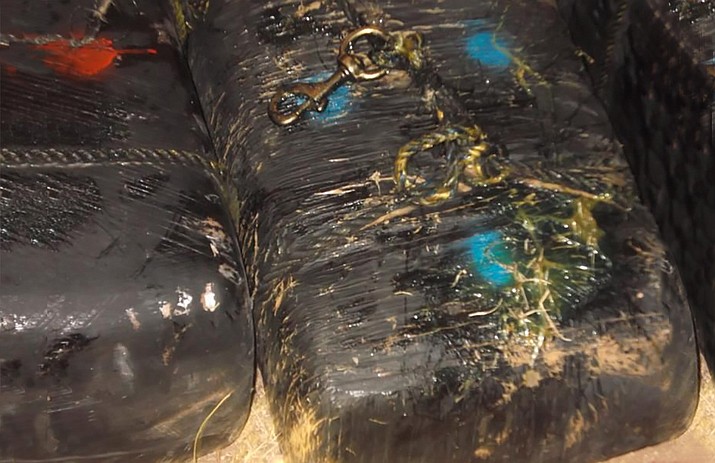 Border Patrol agents in southern Arizona arrested an 18-year-old man and seized 10 bundles of marijuana after a cross-border zip line smuggling attempt. (U.S. Customs and Border Protection)