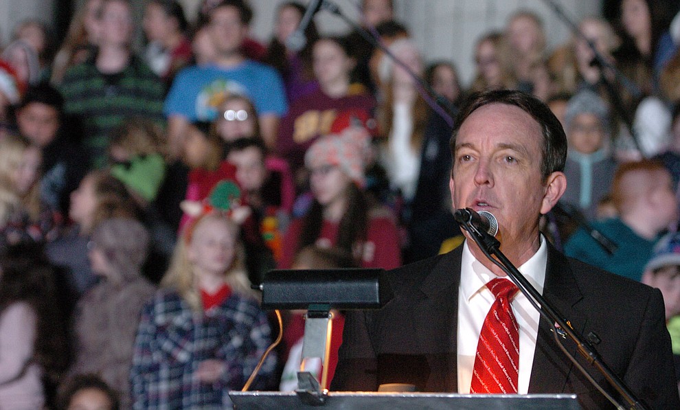 Ken Bennett recites a Christmas Story during the annual Courthouse Lighting in downtown Prescott Saturday, December 2. (Les Stukenberg/Courier)