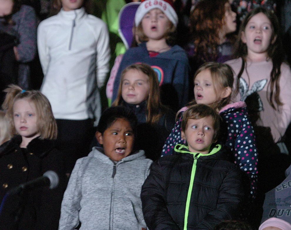 CHildren from the quad city area sing during the annual Courthouse Lighting in downtown Prescott Saturday, December 2. (Les Stukenberg/Courier)