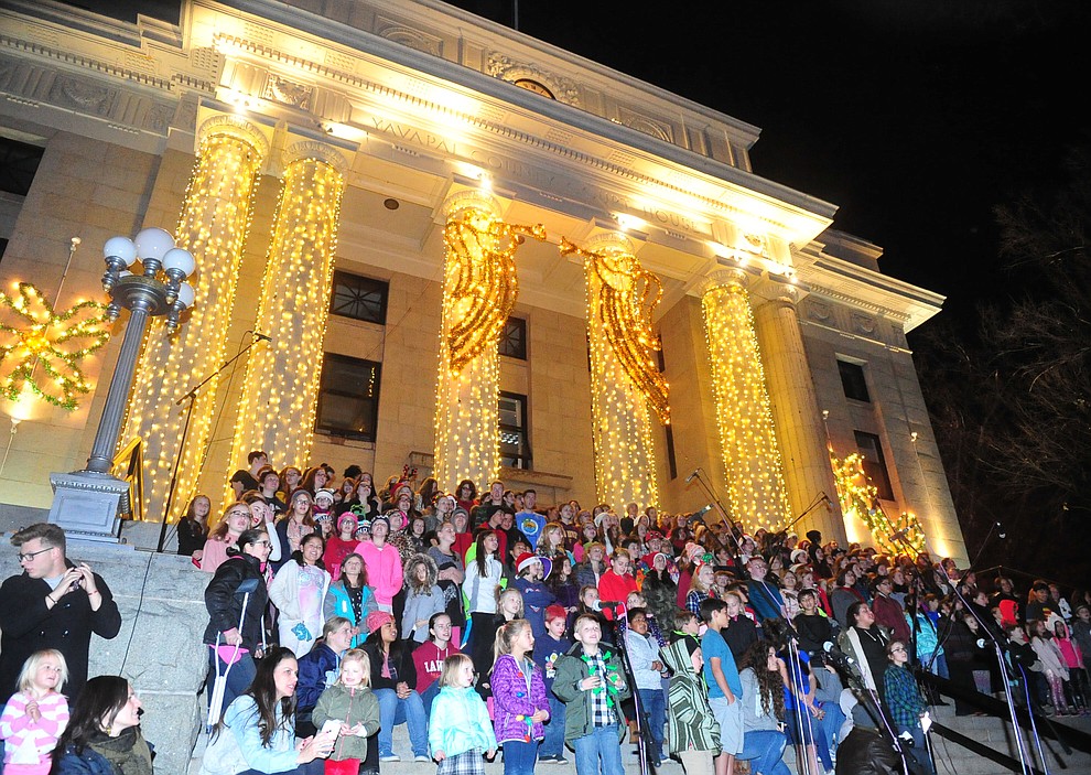 Children from the quad city area sing during the annual Courthouse Lighting in downtown Prescott Saturday, December 2. (Les Stukenberg/Courier)
