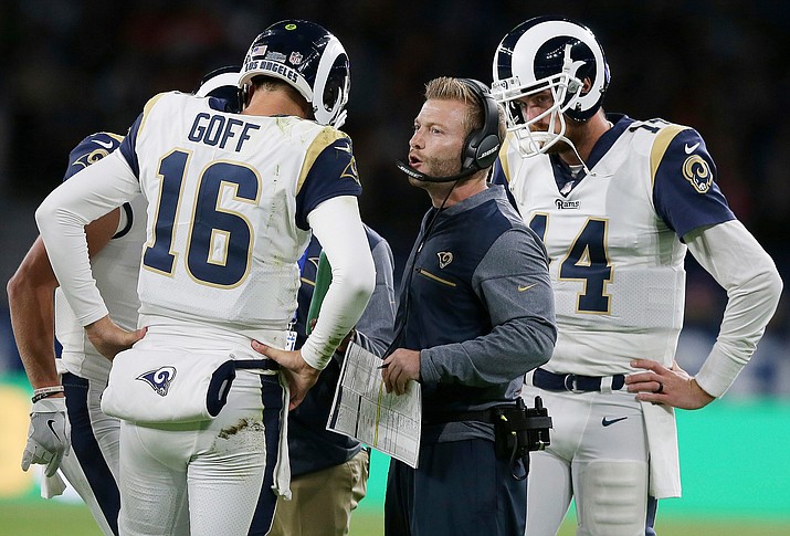 Los Angeles Rams coach Sean McVay speaks with quarterback Jared Goff (16) during the first half of an NFL football game against the Cardinals in London. (Tim Ireland, AP file)
