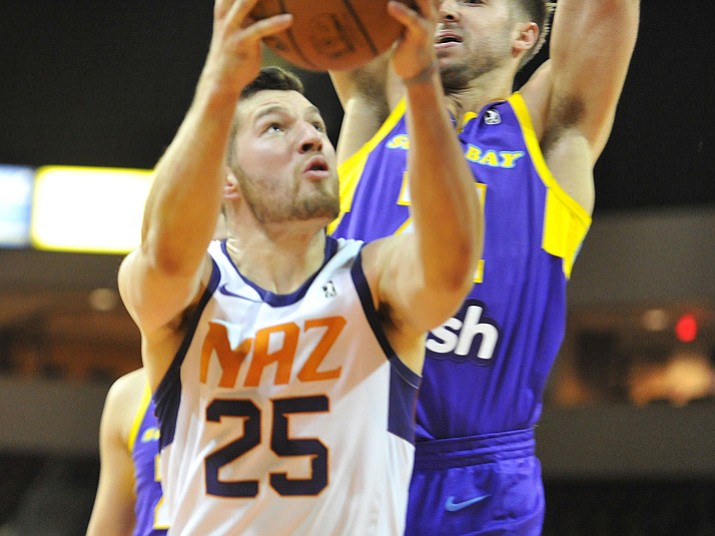 Northern Arizona’s Alec Peters goes up for a basket as the Suns face the South Bay Lakers on Tuesday, Dec. 5, 2017, in Prescott Valley. (Les Stukenberg/Courier)